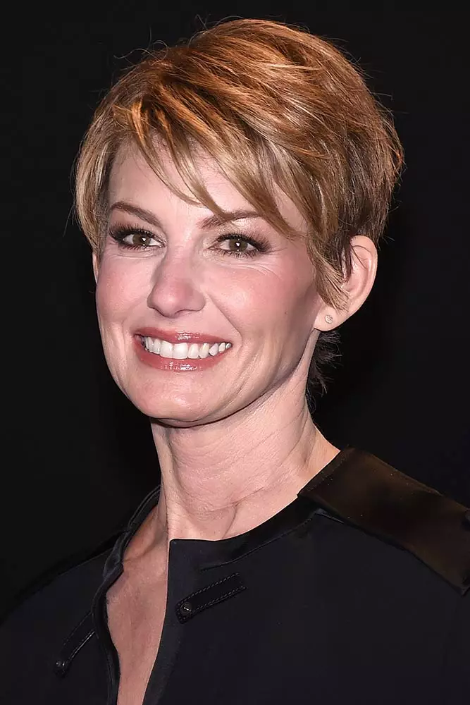 Party hairstyle for women over fifty with short hair - sophisticated updo Elegant short party hairstyle for women over fifty with soft waves
