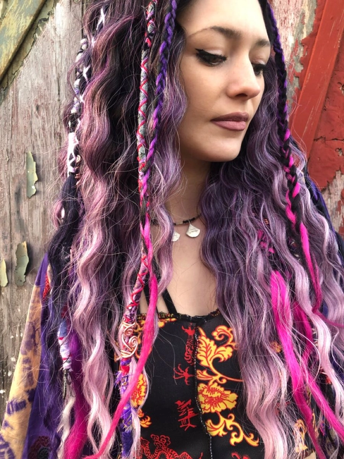 Festival Locs & Dreadlocks Hairstyle Inspiration for Party Looks Festival-ready locs with vibrant accessories and flowing dreadlocks at a summer party