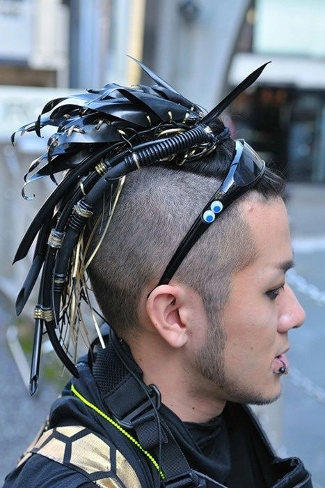 Woman with cyberpunk festival hair featuring neon blue and purple extensions