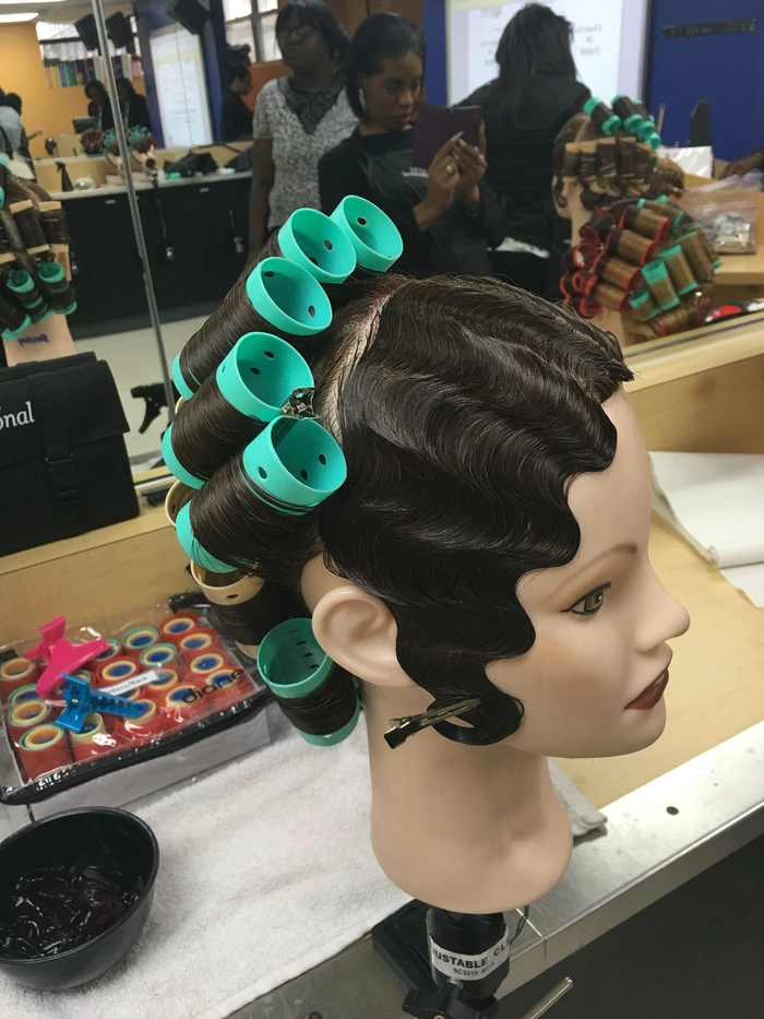 Classic masquerade ball party hairstyle featuring retro finger waves Elegant vintage finger waves hairstyle styled for a masquerade ball party