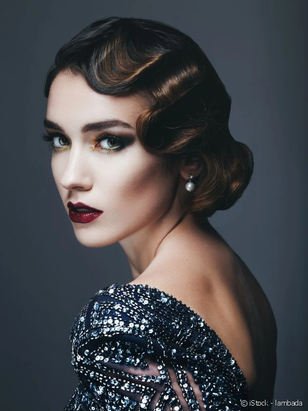 Elegant vintage finger waves for a festive masquerade ball Masquerade ball hairstyle with vintage finger waves
