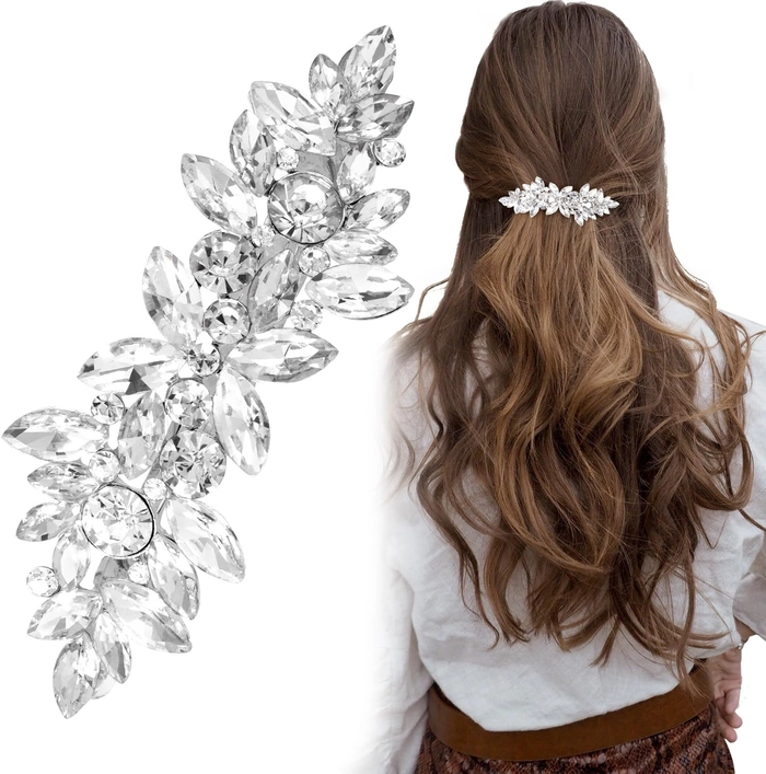 Maximalist party hair embellished with sparkling rhinestones A bold maximalist party hairstyle featuring heavy rhinestone accessories