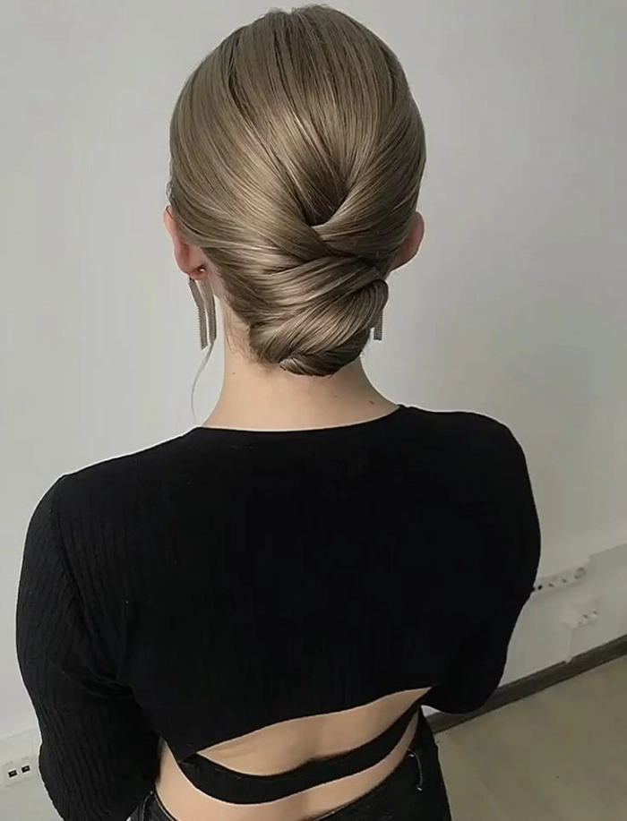 Minimalist Sleek Party Bun - Elegant Updo for Formal Occasions Minimalist sleek party bun hairstyle for formal events with clean lines and smooth finish
