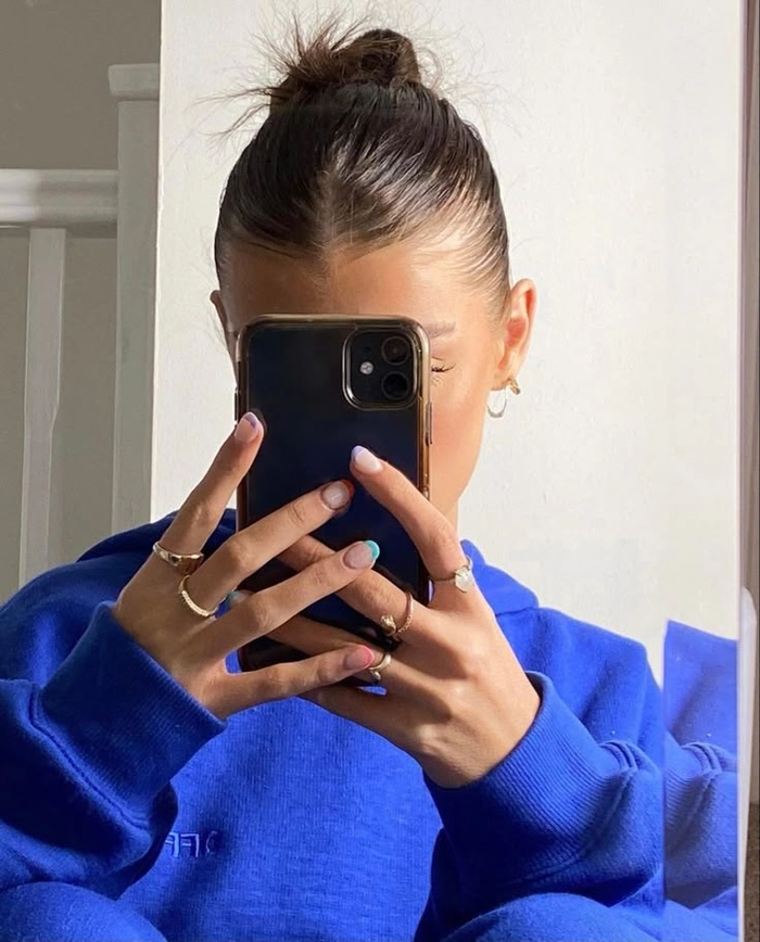 Minimalist Sleek Party Bun Hairstyle for Formal Events and Celebrations Minimalist sleek party bun for formal events with polished finish