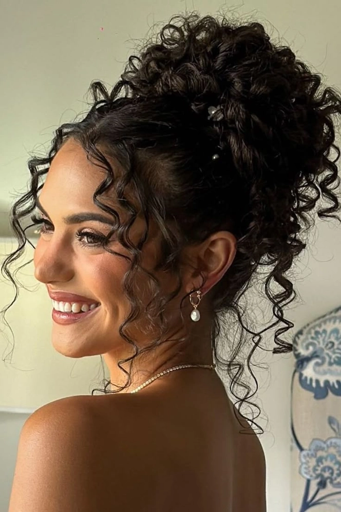 Party updos for natural tight curl pattern hair - hairstyle 11 Elegant party updo showcasing natural tight curl pattern hair for a festive occasion