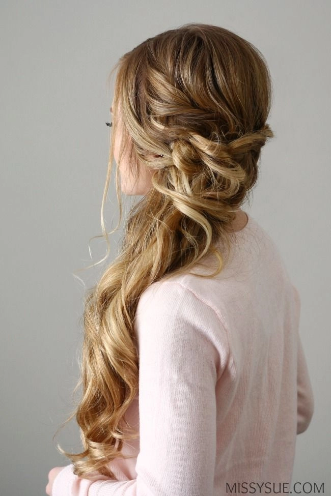 Side swept curls styled with an asymmetric dress for New Year's Eve party