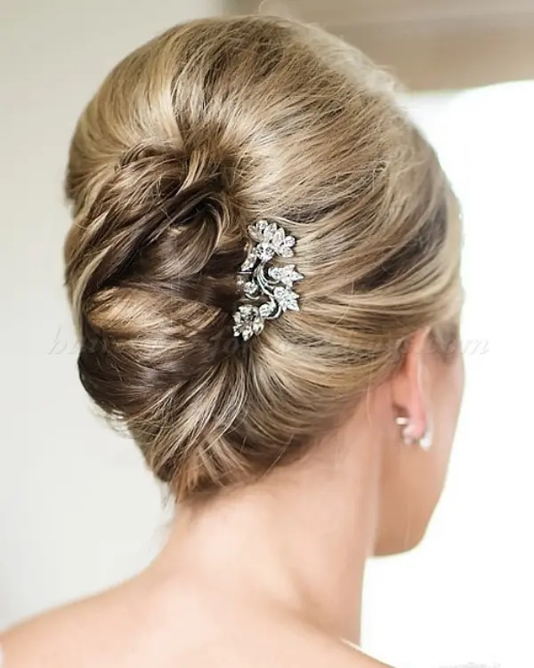 Party hairstyle idea: French twist updo for formal gowns Elegant French twist updo with sparkling hairpins complementing a formal gown
