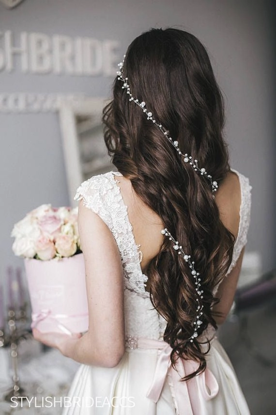 Party hairstyle with pearl hair vine accents