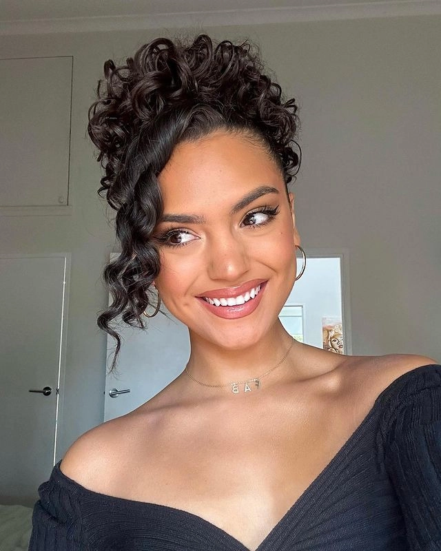 Party updo for natural tight curls - elegant hairstyle inspiration for celebrations Natural party updo hairstyle showcasing tight curl pattern on afro-textured hair, elegant and chic updo for special occasions