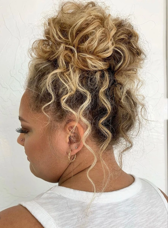 Tight Curl Updo - Elegant Party Hairstyle for Natural Hair Party updo hairstyle for natural tight curl pattern hair styled with volume and elegance