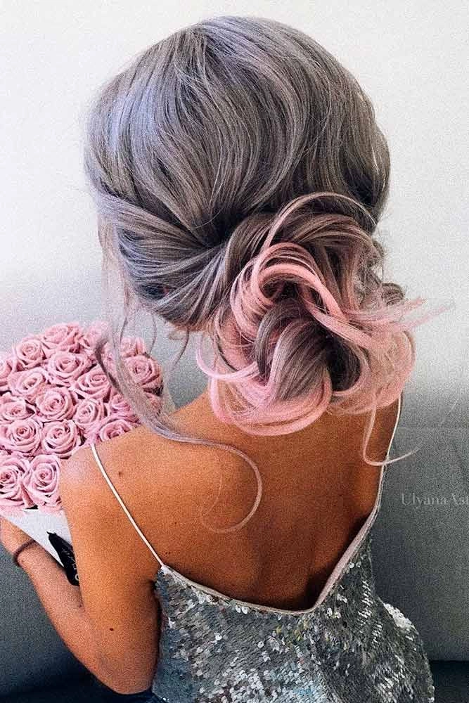 Elegant pastel pink updo for a wedding party Wedding guest updo hairstyle on pastel pink hair
