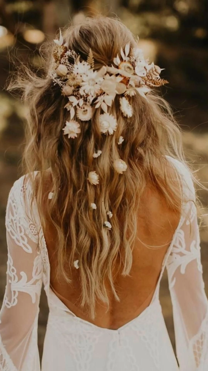 Elegant flower crown integration for a romantic prom updo Prom hairstyle with fresh flower crown woven into loose waves
