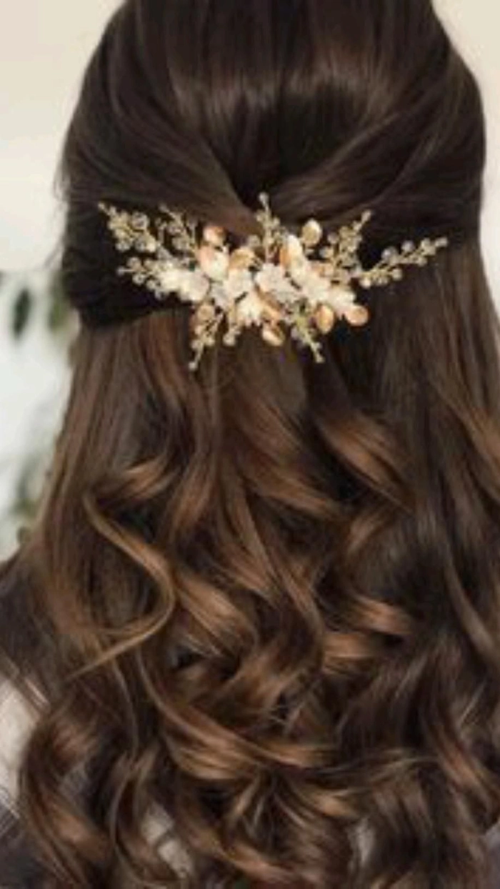 Elegant prom updo with sparkling hair accessories for a high school senior party hairstyle