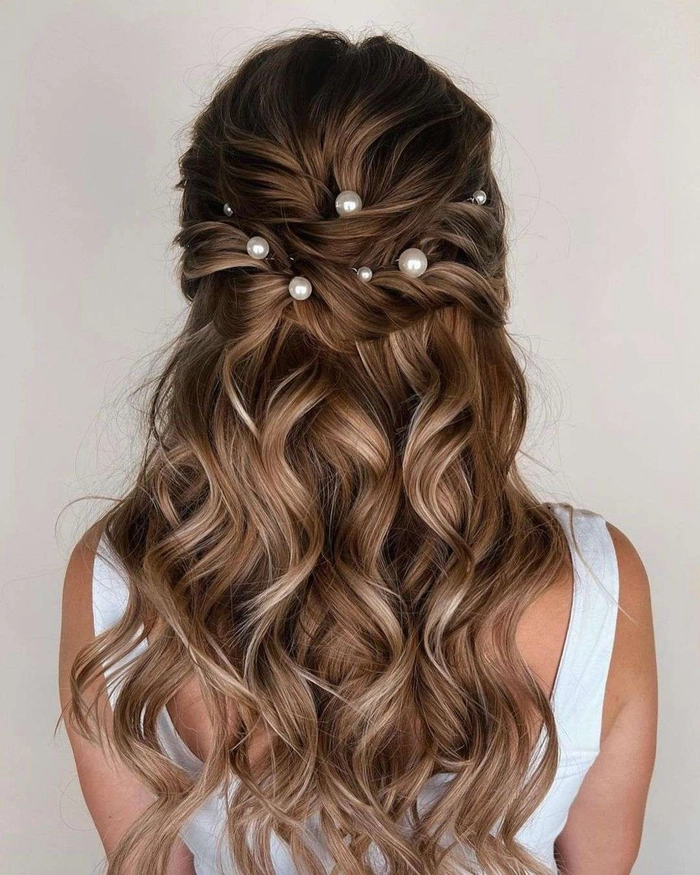 Stunning prom updo for ombre hair with soft curls and floral accents