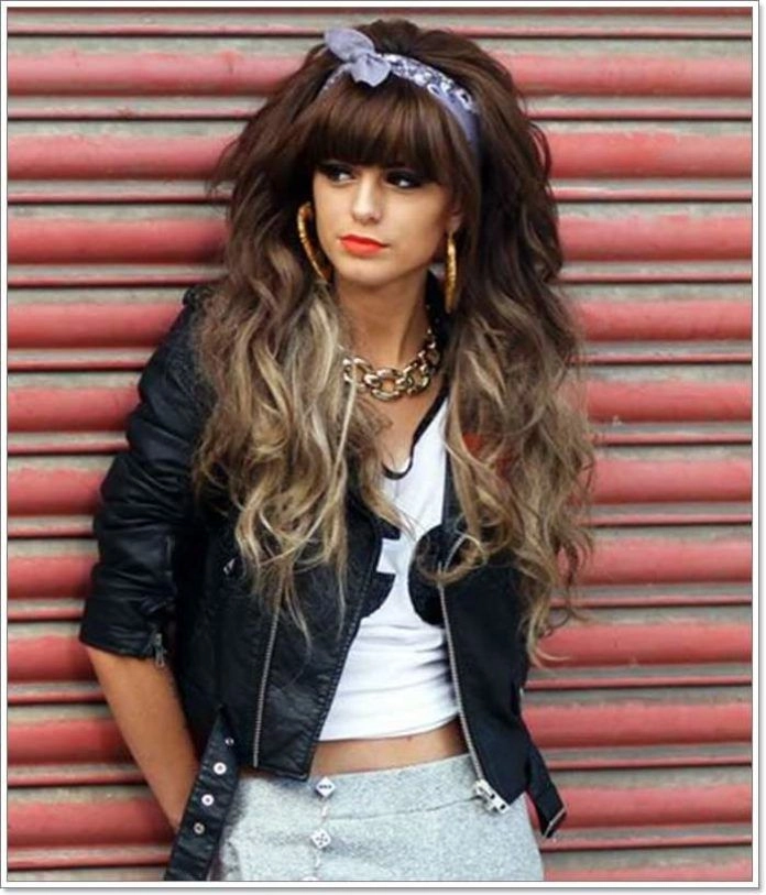 Retro eighties party hairstyle with massive volume and teased curls