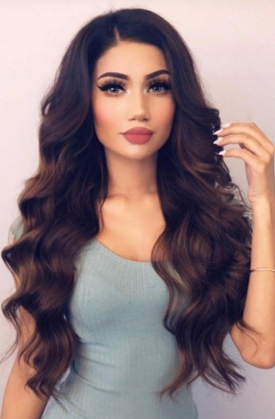 Sweat proof clubbing hairstyle with braided crown and hairspray for hot venues