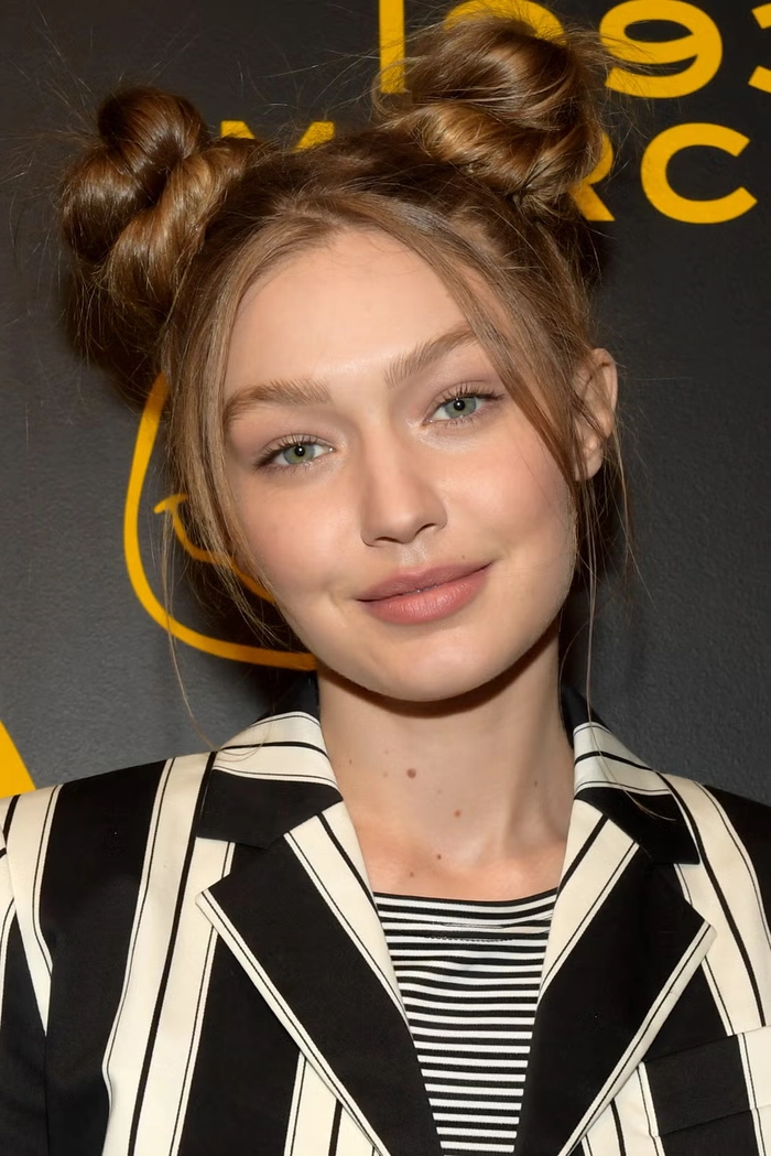 Trendy club hairstyle for college students featuring braided crown with loose waves, perfect for party night