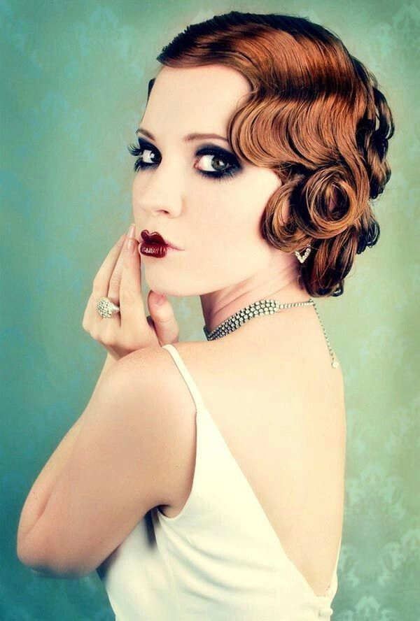 Vintage Great Gatsby party hairstyle with elegant finger waves and glamorous side sweep