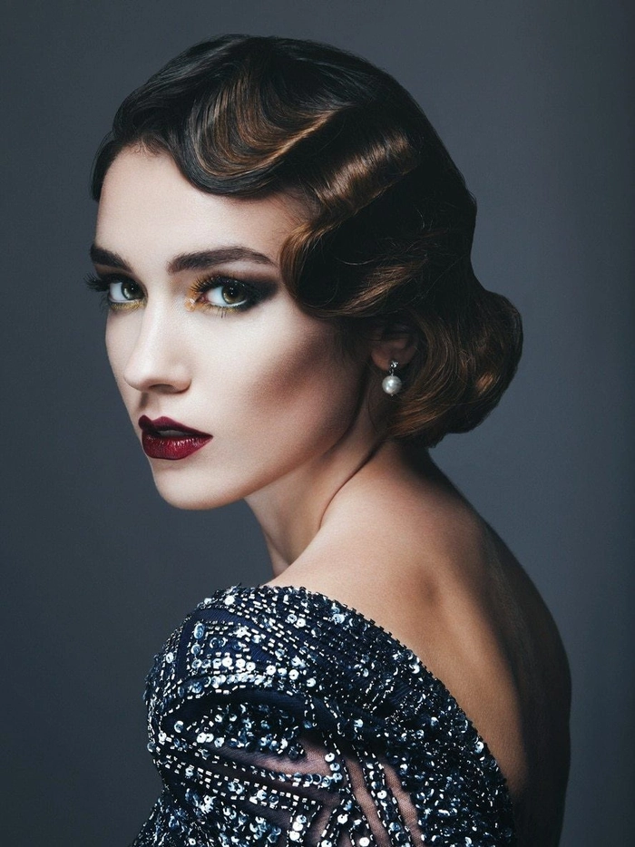 Vintage Great Gatsby party hairstyle with sculpted finger waves and elegant side sweep