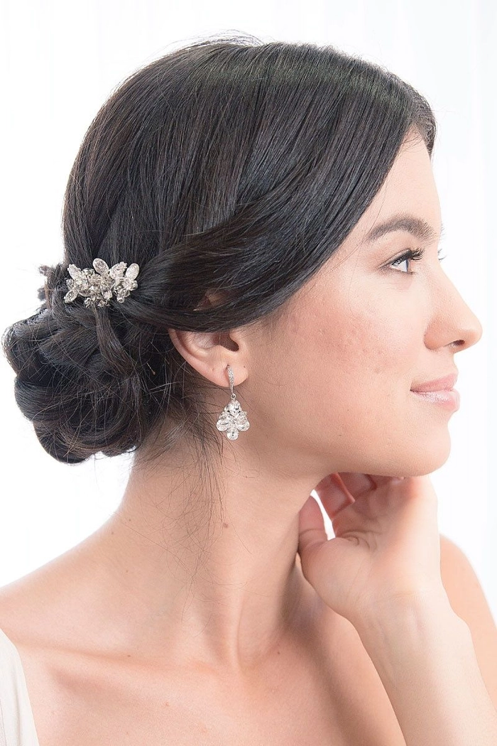 Wedding guest hairstyle adorned with sparkling crystal hairpins
