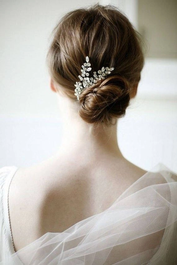 Wedding guest hairstyle with sparkling crystal hairpins