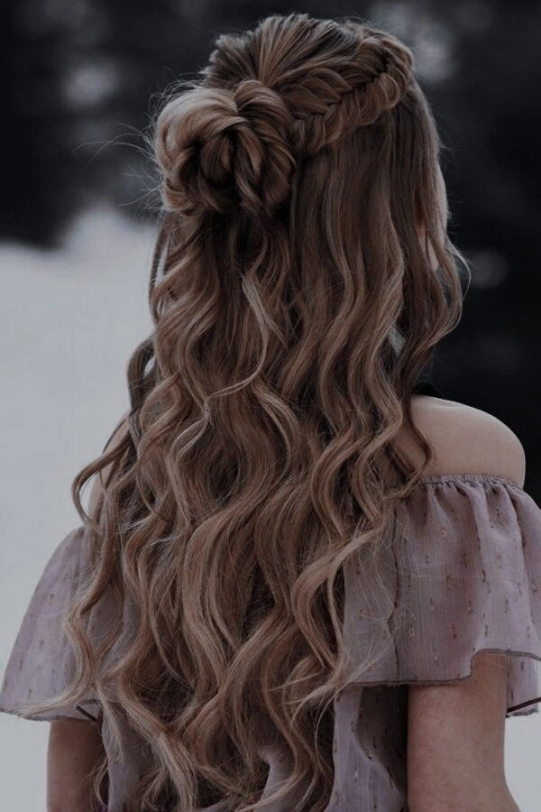 Elegant winter gala updo for medium curly hair with sparkling accessories