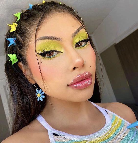 Y2K party hairstyle with colorful butterfly clips and teased updo