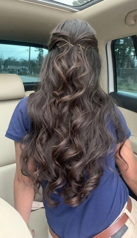 Chic prom hairstyle perfect for black tie optional events with loose waves and natural volume Elegant black tie optional prom hairstyle with soft curls and a subtle accessory
