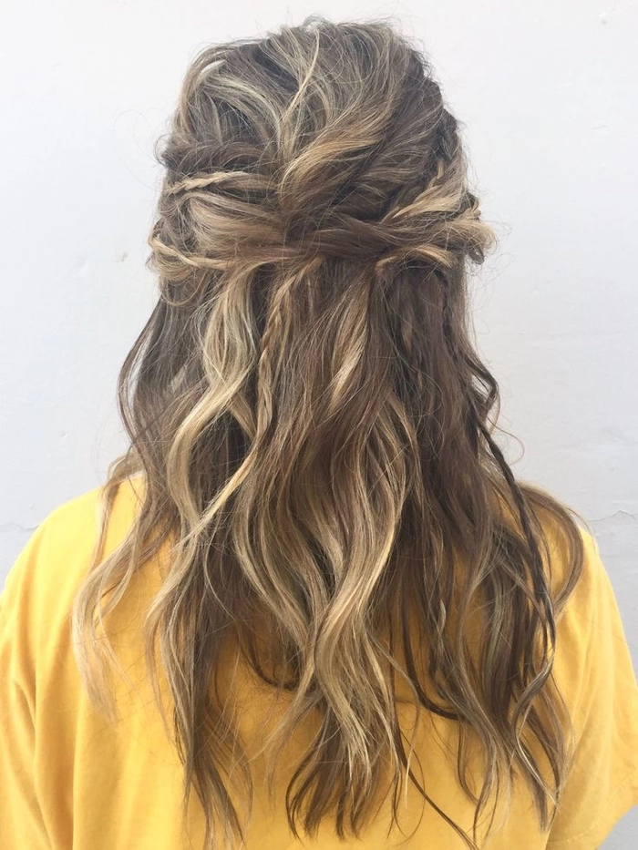 Boho chic prom hairstyle featuring soft loose waves and natural texture