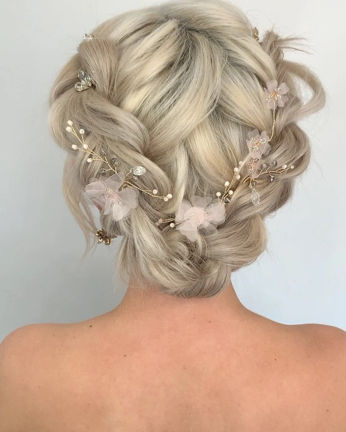 Sophisticated braided crown style perfect for prom night 9 Elegant braided crown prom hairstyle with loose curls