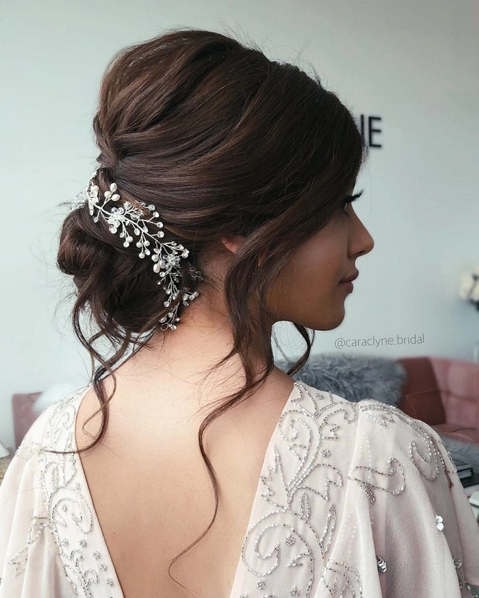 Elegant braided updo perfect for prom hairstyles at a rustic barn venue