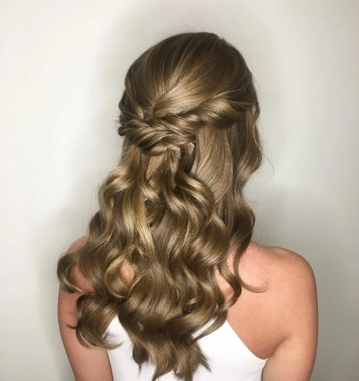 Elegant easy last minute prom hairstyle with soft curls and a braided crown
