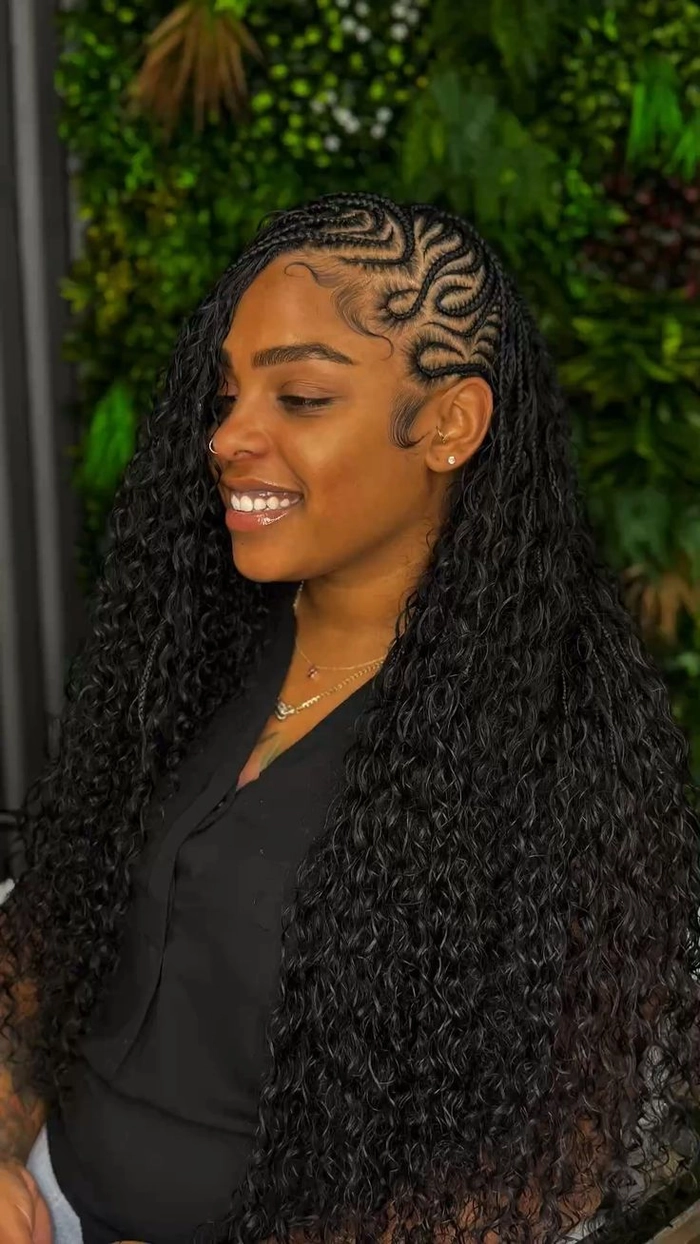 Elegant prom hairstyle featuring a braided mohawk with soft curls