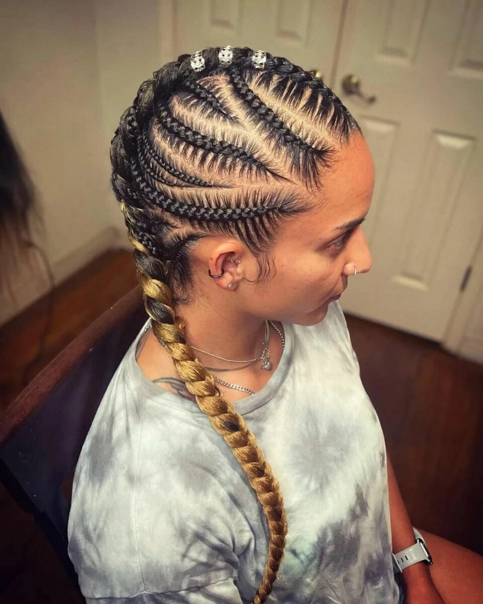 Elegant prom hairstyle featuring a braided mohawk with intricate detailing