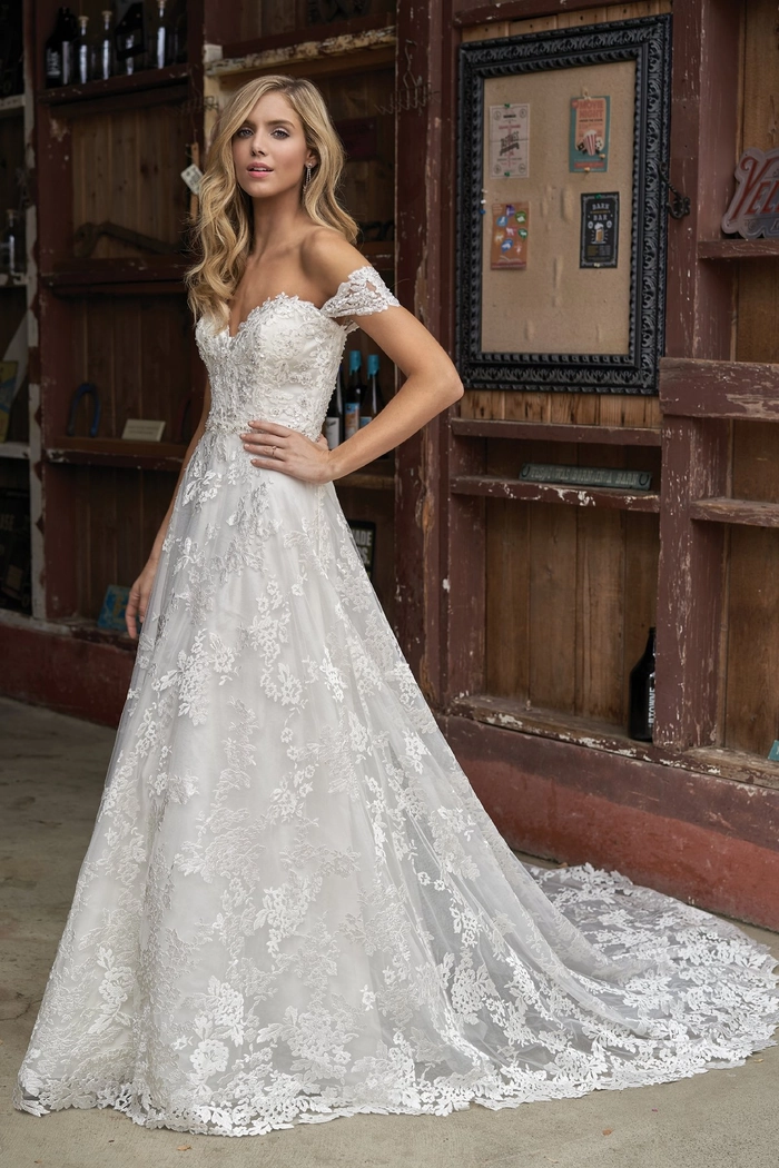 Elegant braided prom hairstyle complementing a sweetheart neckline gown