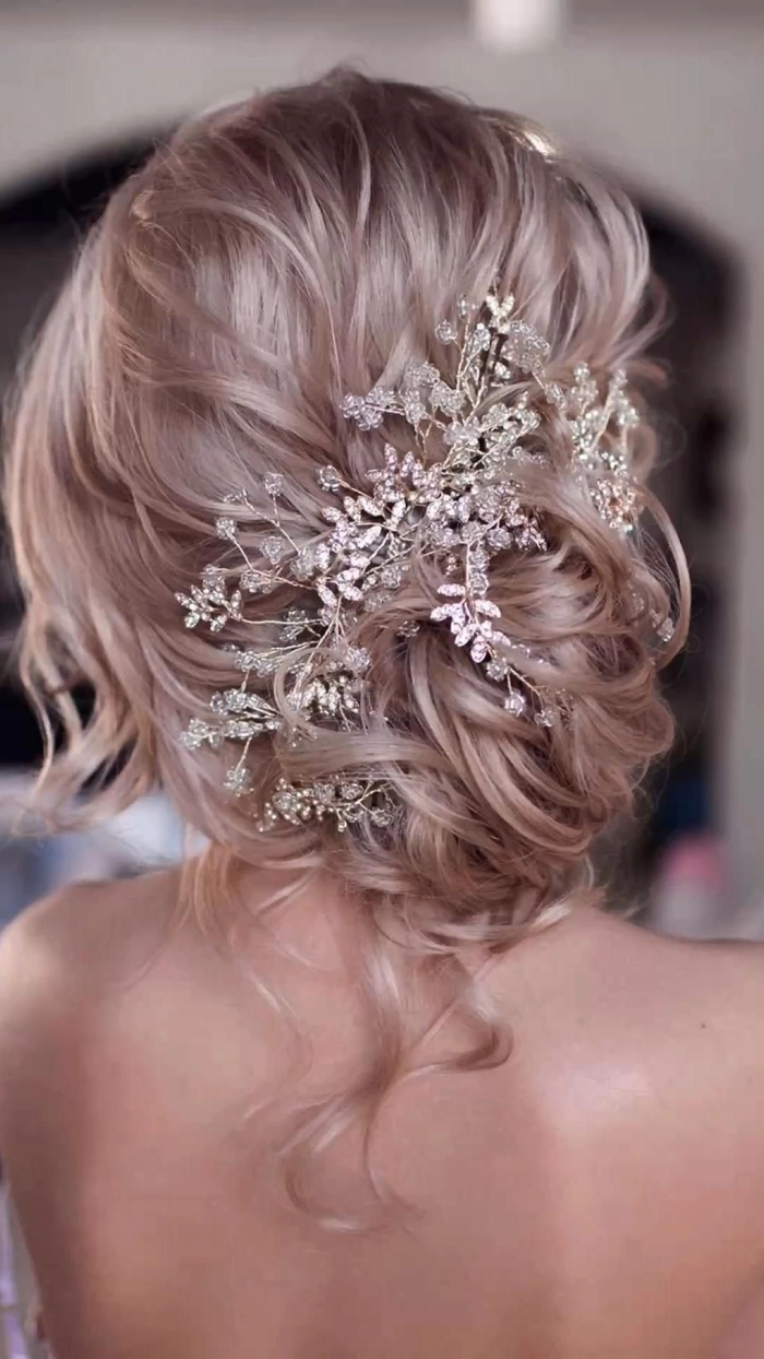 Elegant braided prom hairstyle perfect for a rustic barn venue setting