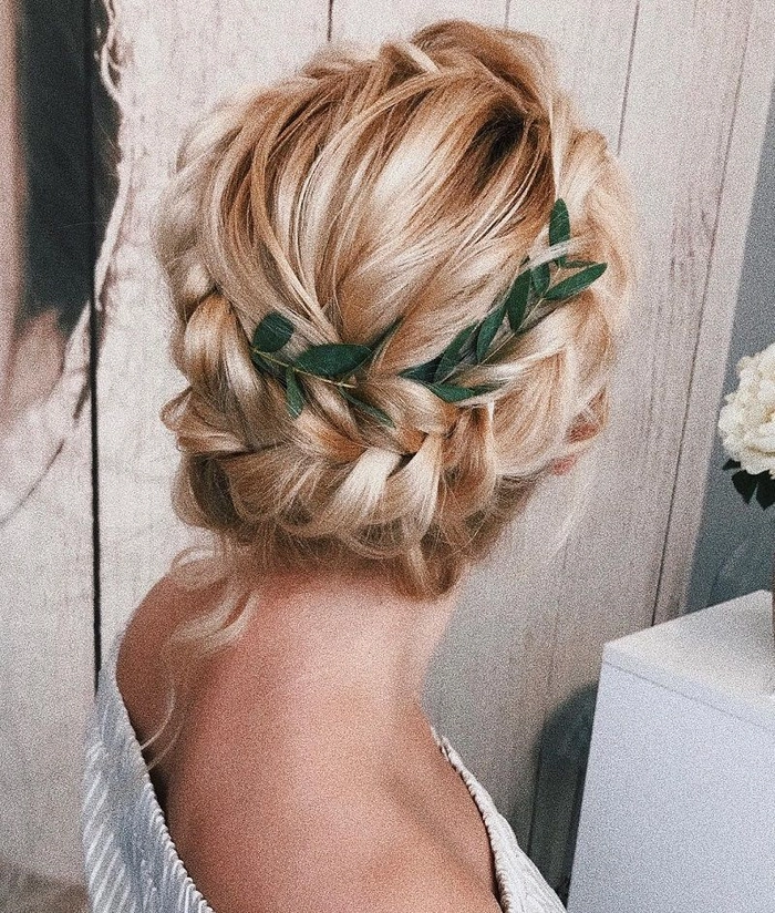 Elegant braided prom hairstyle perfect for a rustic barn venue