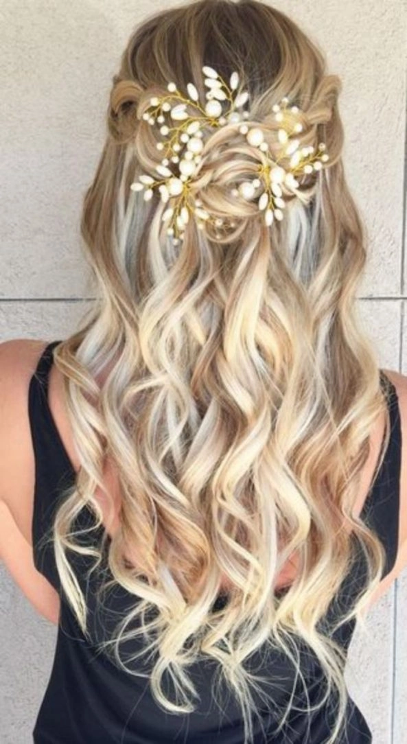Elegant braided updo perfect for prom hairstyles to match a white dress