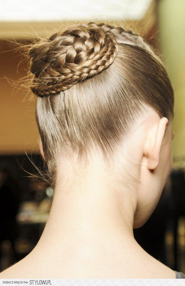 Timeless classic ballet bun hairstyle perfect for prom and formal occasions Elegant classic ballet bun prom hairstyle with smooth finish and decorative hairpiece