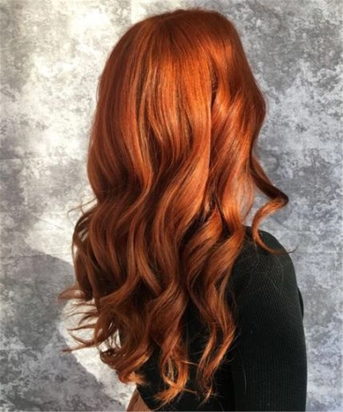 Elegant prom hairstyle showcasing copper ginger hair with soft curls