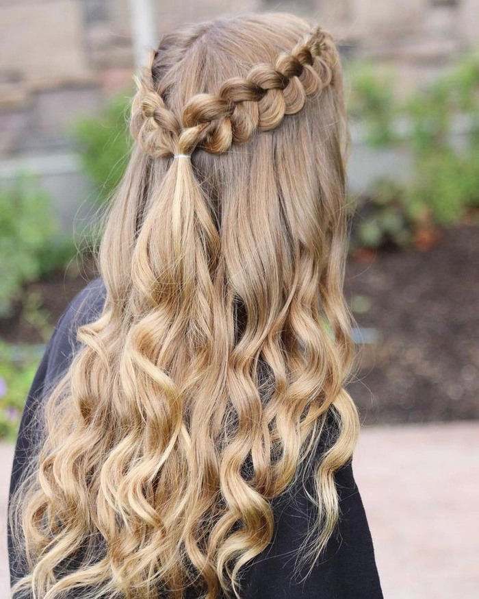 Chic prom hairstyles with a Dutch braid for a memorable evening Elegant prom hairstyle featuring a Dutch braid for a sophisticated look