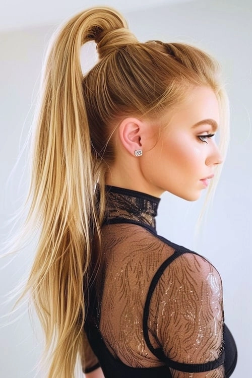 Stylish and polished high sleek ponytail for prom night look Elegant high sleek ponytail prom hairstyle with smooth finish