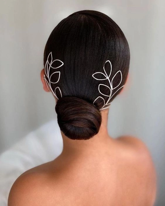 Stunning prom hairstyle designed to withstand humidity and keep curls intact Elegant humidity resistant prom hairstyle with soft curls and smooth finish