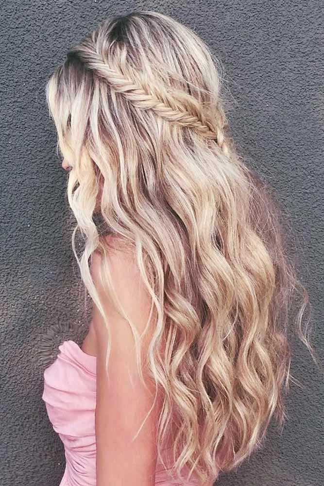 Stunning hairstyle perfect for prom nights with humidity control Elegant humidity resistant prom hairstyle with soft curls