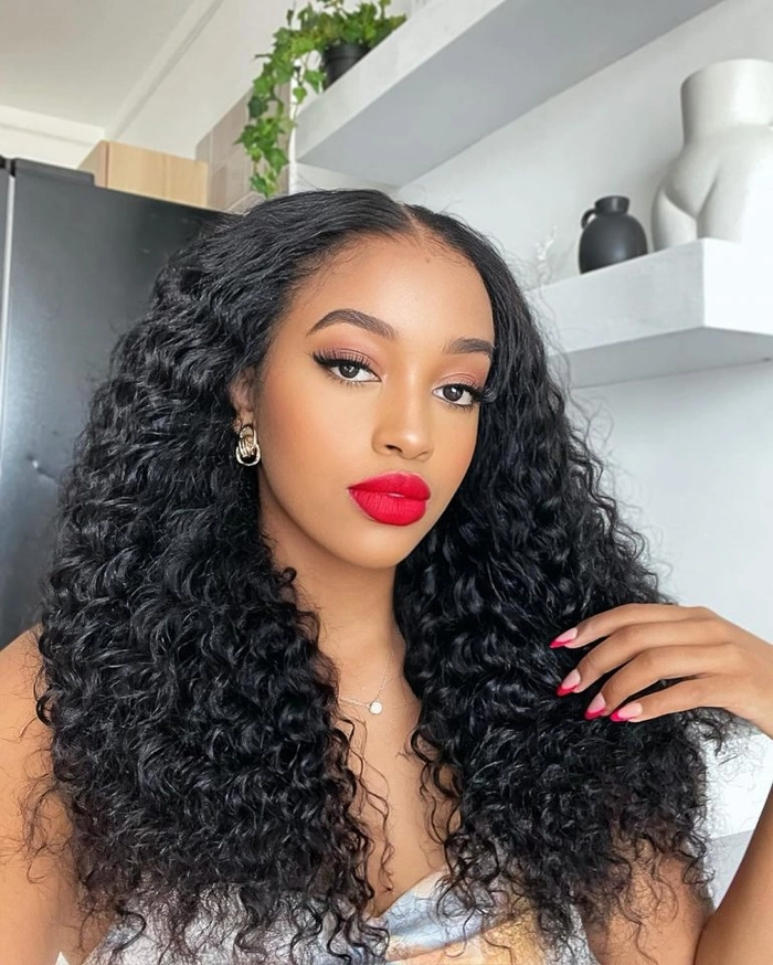 Stylish middle part prom hairstyle perfect for a chic and sophisticated look Elegant prom hairstyle featuring a middle part with soft curls flowing down