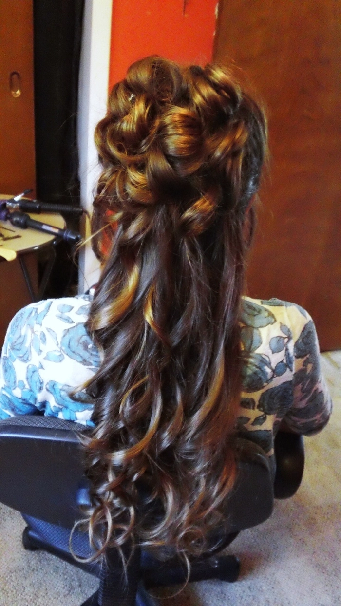 Sophisticated prom hairstyle perfect for a military ball event Elegant military ball formal hairstyle with intricate curls and a sleek finish