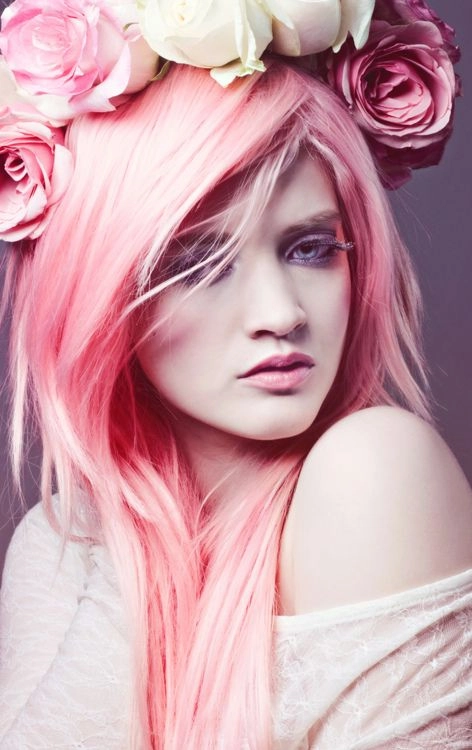 Beautiful prom hairstyle inspiration for pastel pink hair on image number 12 Elegant prom hairstyle featuring pastel pink dyed hair styled in soft waves