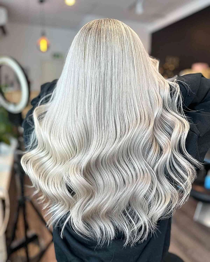 Elegant prom hairstyles for platinum blonde hair with soft curls