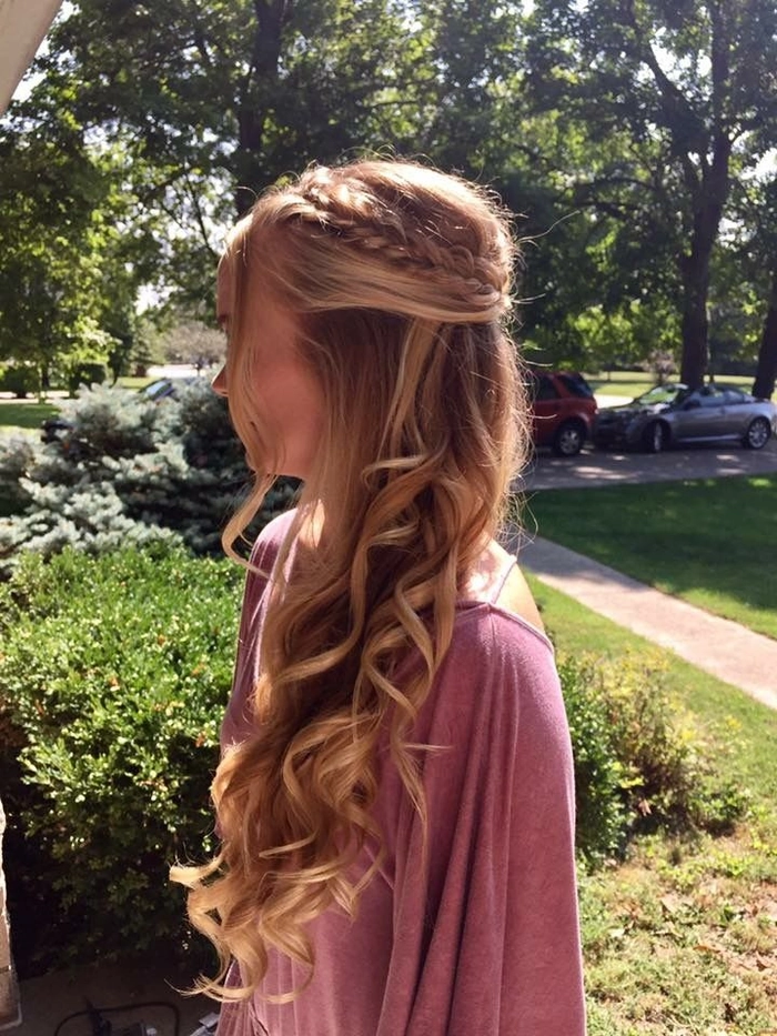 Sophisticated prom look showcasing a Dutch braid hairstyle perfect for formal events Elegant prom hairstyle featuring a Dutch braid with loose curls
