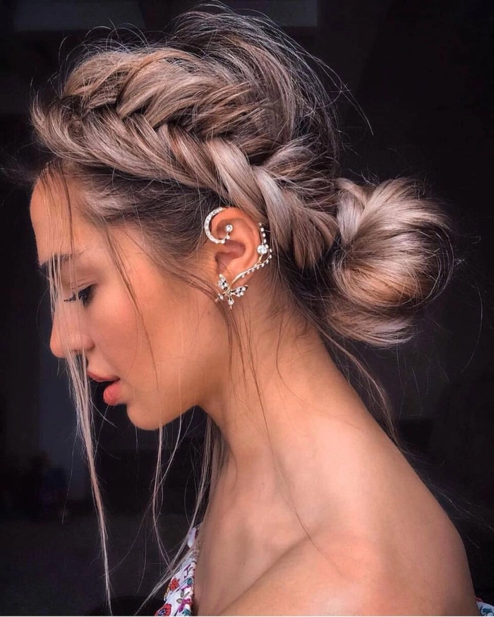 Sophisticated prom look showcasing a detailed Dutch braid style Elegant prom hairstyle featuring a Dutch braid woven into loose curls